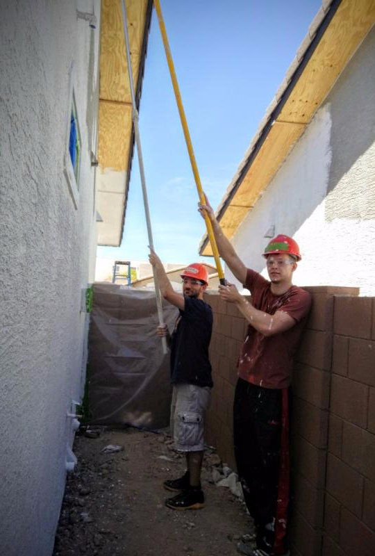 Volunteers xx and xx reach new heights.