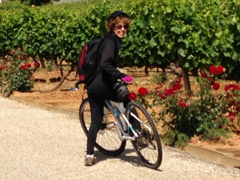 Professor Emerita Barbara Atwood at vineyard in central Portugal on a biking trip.