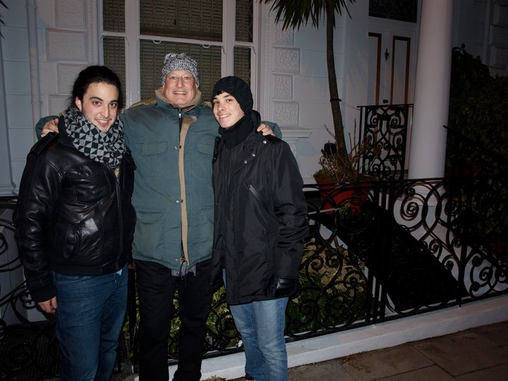 Undergraduate Teaching Fellow Jim Diamond and his two sons standing in front  of the flat in Notting Hill, London where Jimi Hendrix died in 1970.